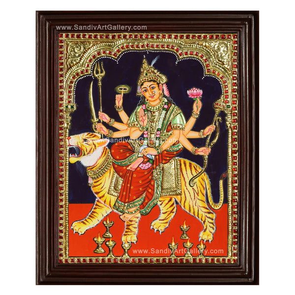 Authentic Durga Tanjore Painting  featuring real 22-karat gold foil embossing and vibrant colors within a teakwood frame.